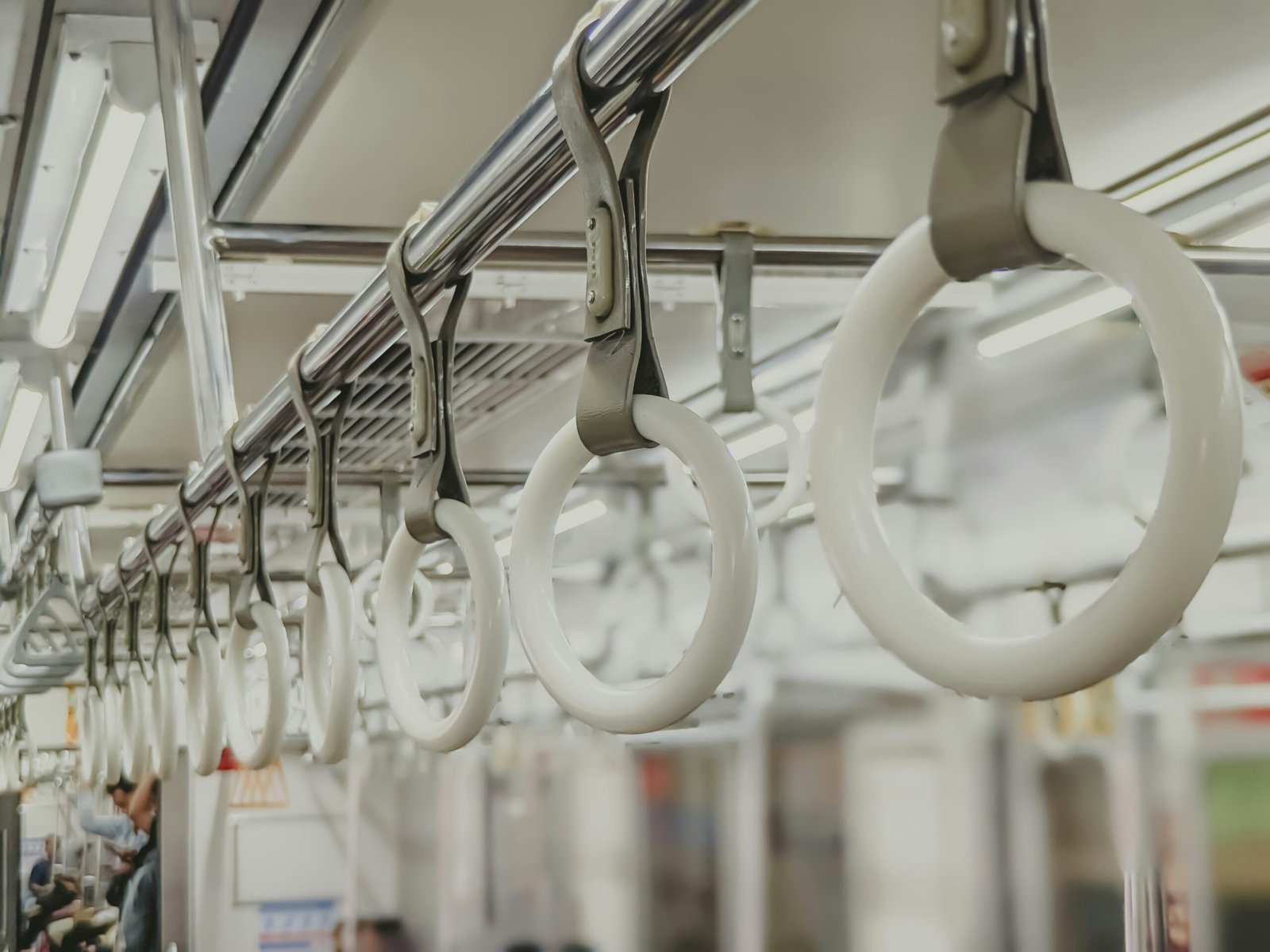 a row of white rings hanging from a ceiling